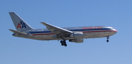 Airliner landing showing its flaps extended and down so as to reduce its speed and decrease its stall speed